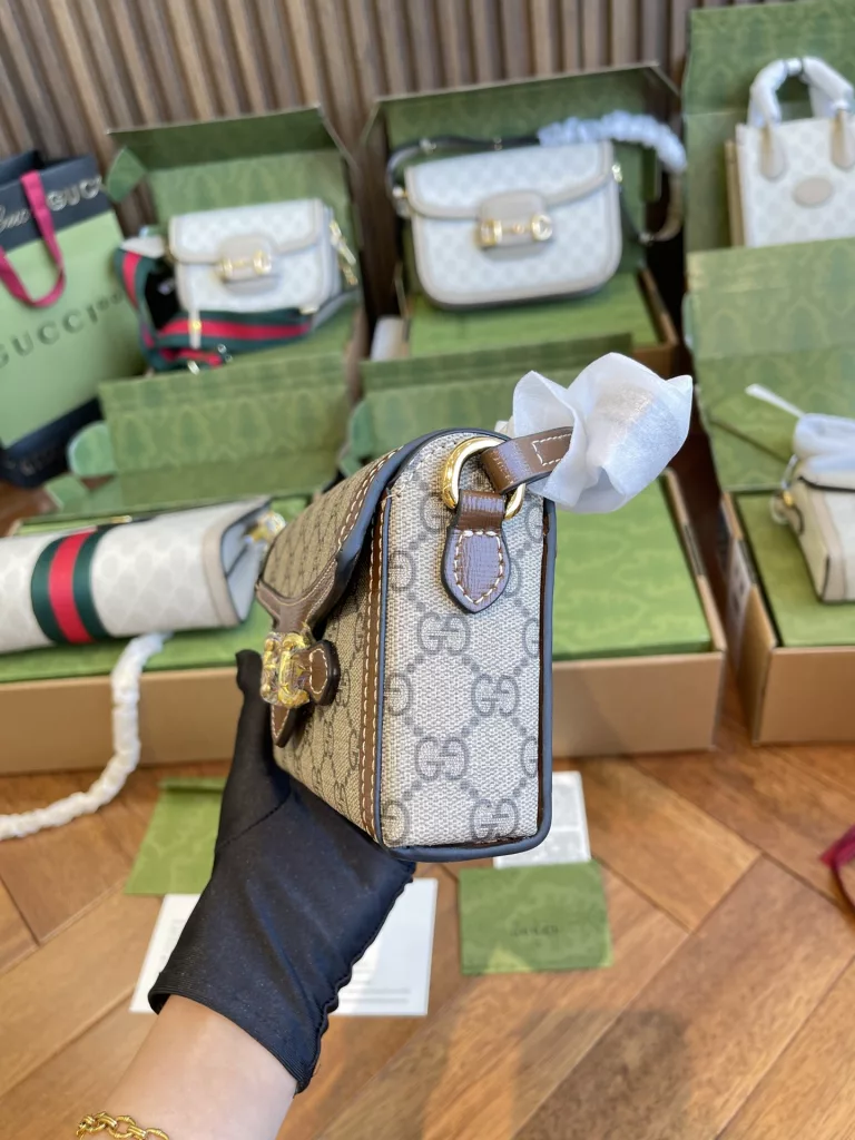 The Gucci March of Love collection is a new interpretation of the brand's iconic elements, paying tribute to the enduring glamour of Hollywood. This bag is part of Gucci's Horsebit, 1955 collection, and its miniature shape adds to the collection's signature accessories. 18cm (W) x 12cm (H) x 5cm (D)