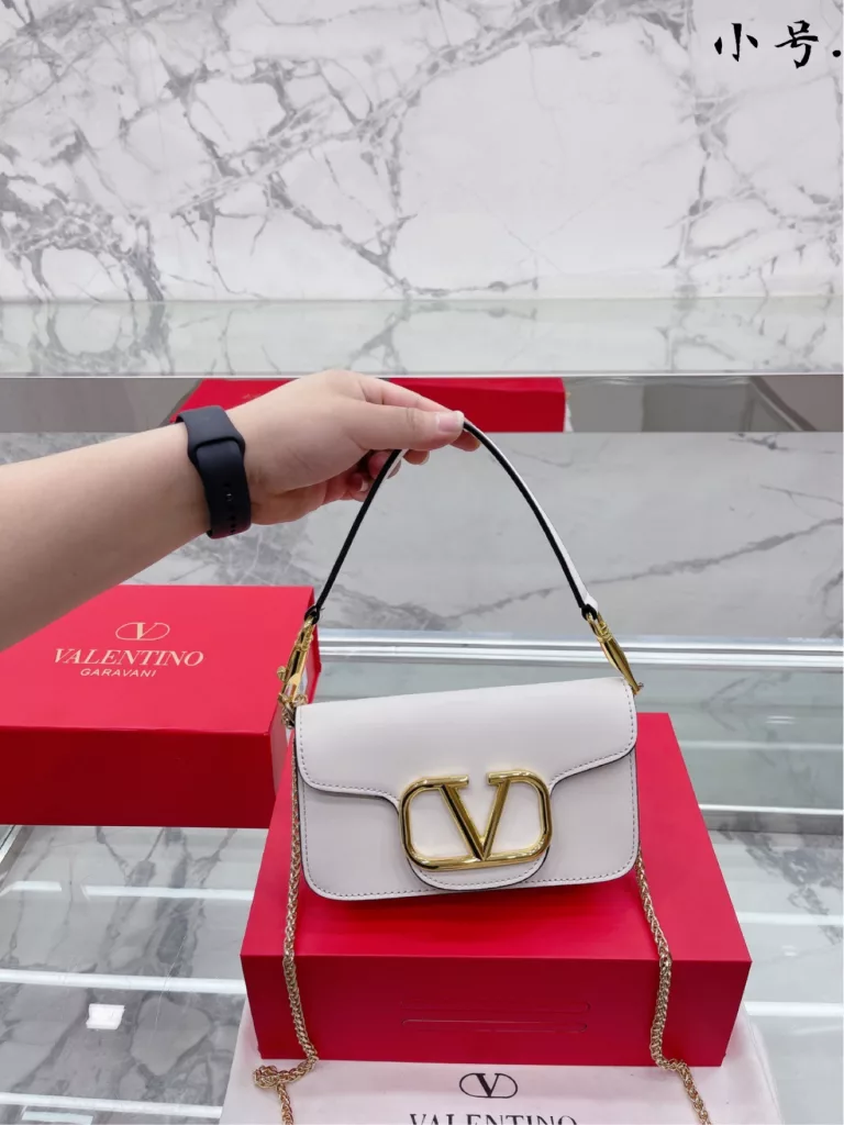 VALENTINO Women's Locò Calfskin Handbag Handbag Crossbody<br>The new Rockstud Alcove accessories collection<br>Iconic vlogo Signature Avant-garde shape creates a unique and seductive appeal.<br>Folded gift box Size 20 13cm