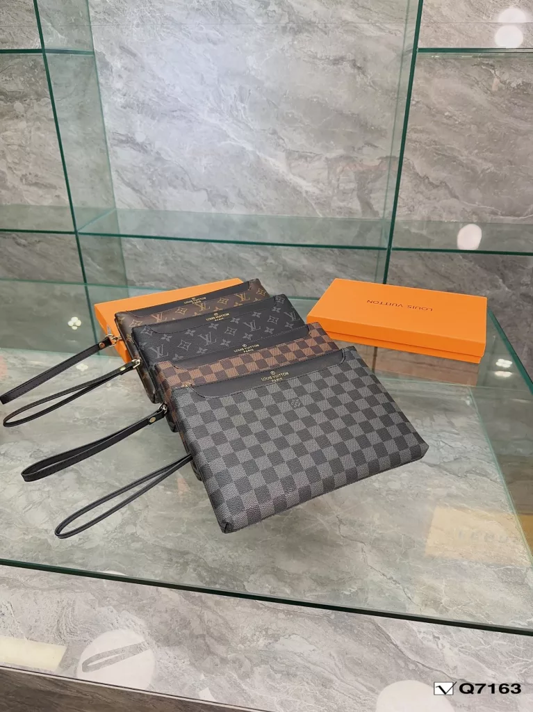 Lv Clutch Collection Clutch Bag The Pochette To-Go Clutch is a trendy alternative to traditional handbags and briefcases. Plenty of room for your phone and personal needs with a removable wrist strap. Size: 28 19