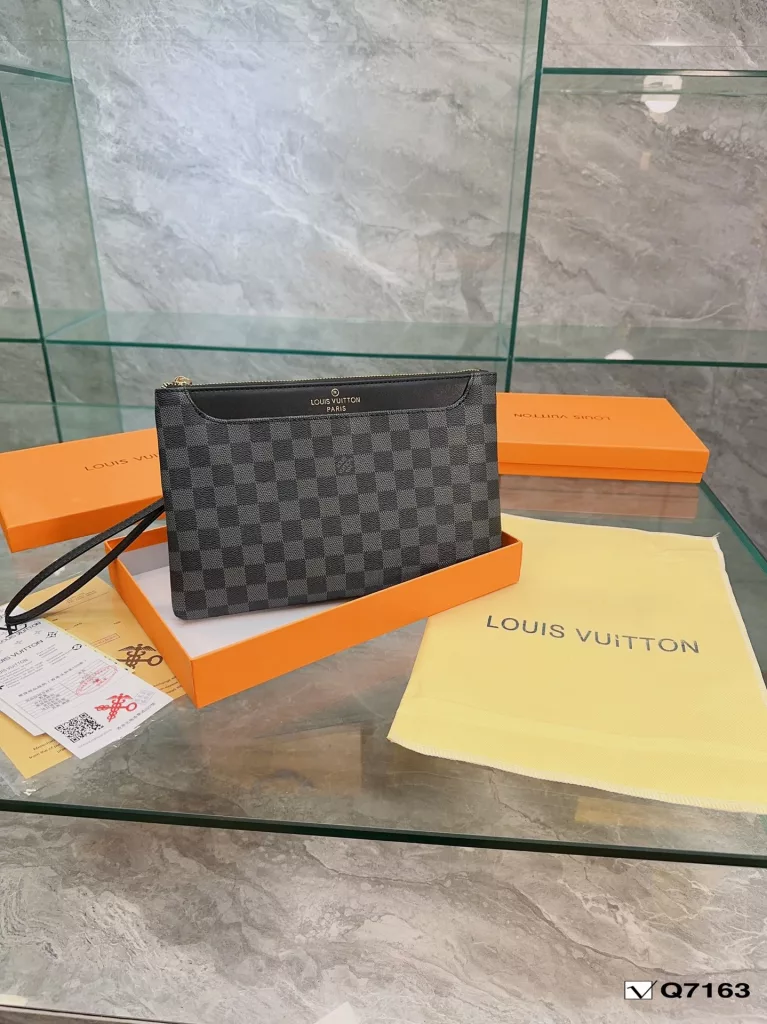 Lv Clutch Collection Clutch Bag The Pochette To-Go Clutch is a trendy alternative to traditional handbags and briefcases. Plenty of room for your phone and personal needs with a removable wrist strap. Size: 28 19