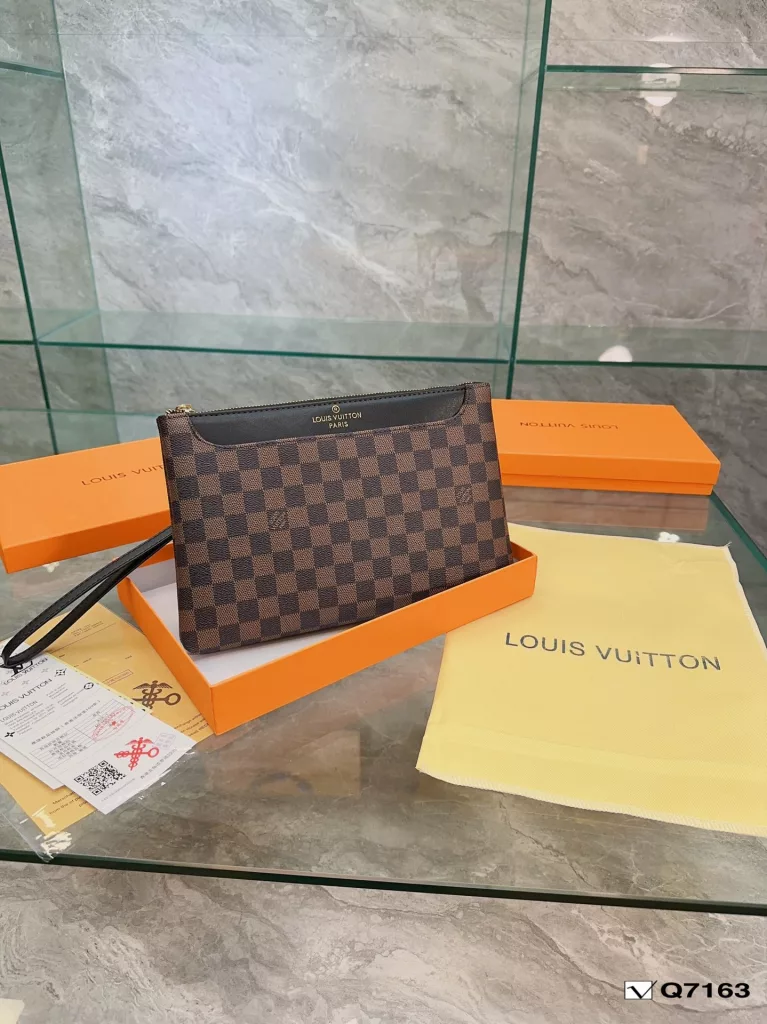 Lv Clutch Collection Clutch Bag The Pochette To-Go Clutch is a trendy alternative to traditional handbags and briefcases. Plenty of room for your phone and personal needs with a removable wrist strap. Size: 28 19