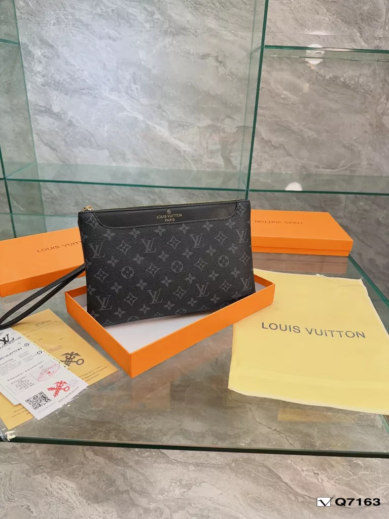 Lv Clutch Collection Clutch Bag The Pochette To-Go Clutch is a trendy alternative to traditional handbags and briefcases. Plenty of room for your phone and personal needs with a removable wrist strap. Size: 28 19