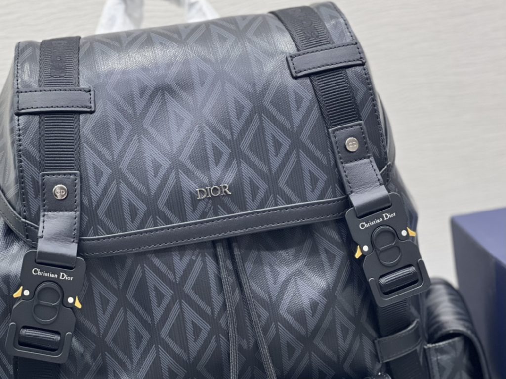 This Dior Hit the Road backpack is a new style this season, combining modern style with Dio's high order spirit. Made with Dio Black CD Diamond canvas, inspired by Dio archives, and decorated with smooth cow leather details. Pair with two 