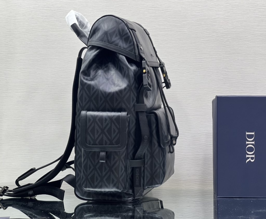 This Dior Hit the Road backpack is a new style this season, combining modern style with Dio's high order spirit. Made with Dio Black CD Diamond canvas, inspired by Dio archives, and decorated with smooth cow leather details. Pair with two 