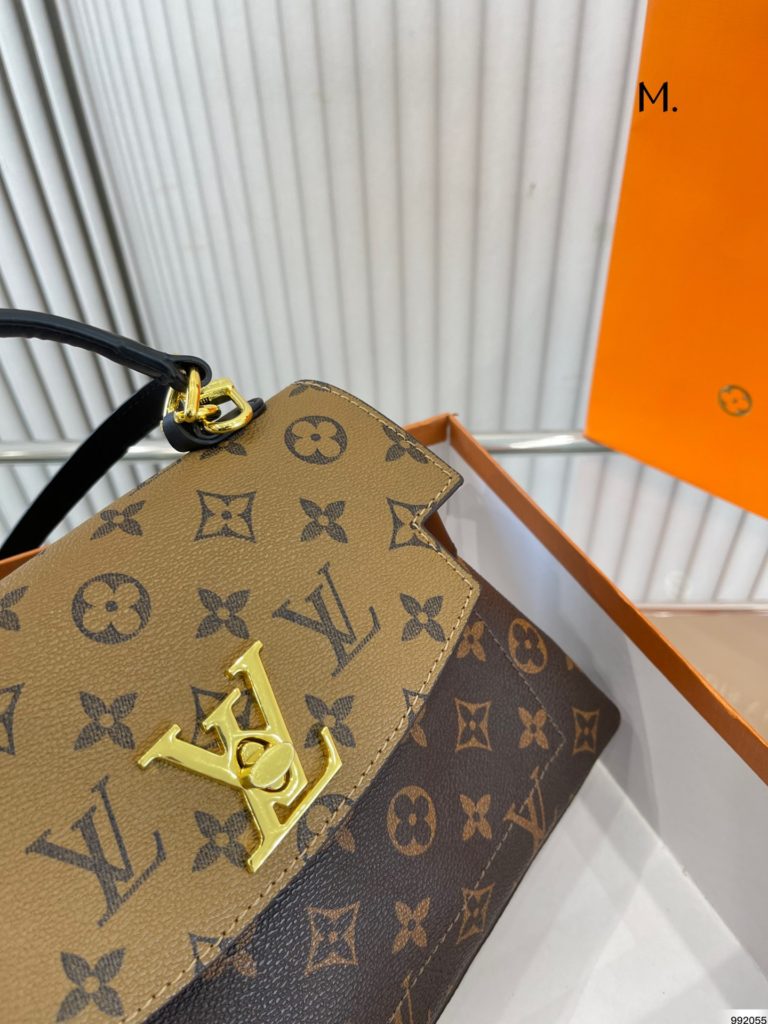 The Lv Lockme ever messenger bag is a stylish and lightweight way to carry your smartphone and other belongings. Made of soft fabric, this bag showcases the key elements of the Lockme collection: the envelope shaped flap, front pocket and LV Initials closure. With a long chain, it can be carried on the shoulder or slung. Size 25 17