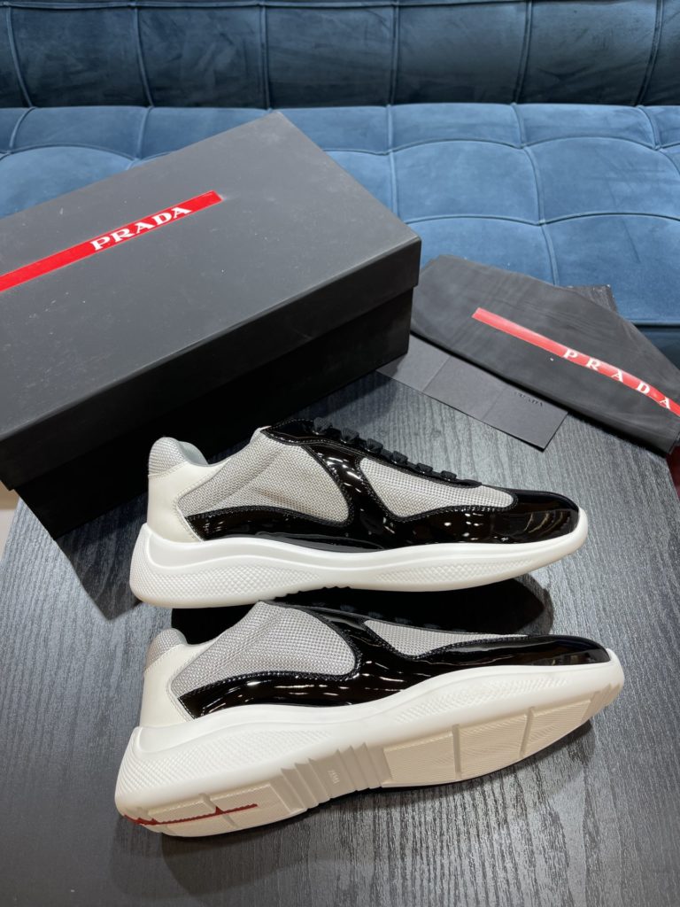 Prada America's Cup Shoe This metallic sneaker is equipped with a lightweight and soft rubber sole, which is comfortable to wear and easy to move. Upper: patent leather, polyamide fiber material metal texture 3cm TPU suction foam sole P450 Size 39-44 (38.45.46.47 customized)