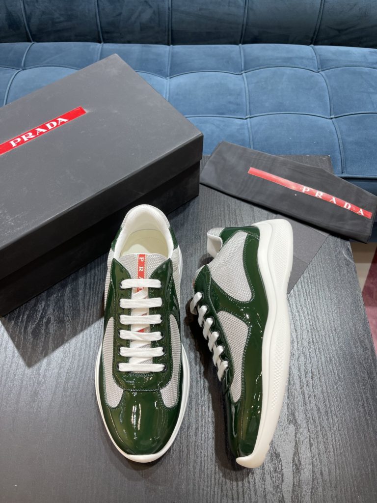 Prada America's Cup Shoe This metallic sneaker is equipped with a lightweight and soft rubber sole, which is comfortable to wear and easy to move. Upper: patent leather, polyamide fiber material metal texture 3cm TPU suction foam sole P450 Size 39-44 (38.45.46.47 customized)