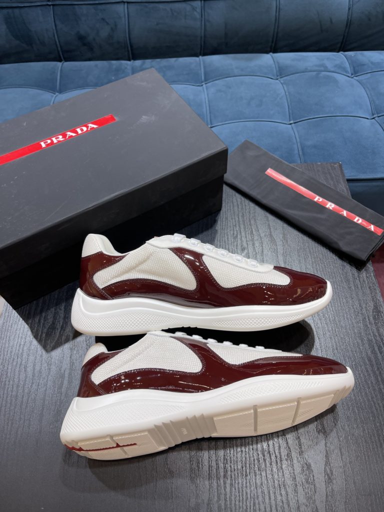 Prada America's Cup Shoe This metallic sneaker is equipped with a lightweight and soft rubber sole, which is comfortable to wear and easy to move. Upper: patent leather, polyamide fiber material metal texture 3cm TPU suction foam sole P450 Size 39-44 (38.45.46.47 customized)