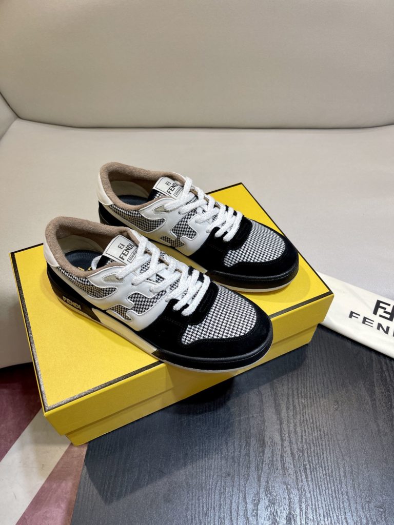 Fendi Match lace-up sneakers. Made of black suede and white leather, with white and black bird check fabric details. Rubber sole with Fendi on the side Size 39-44