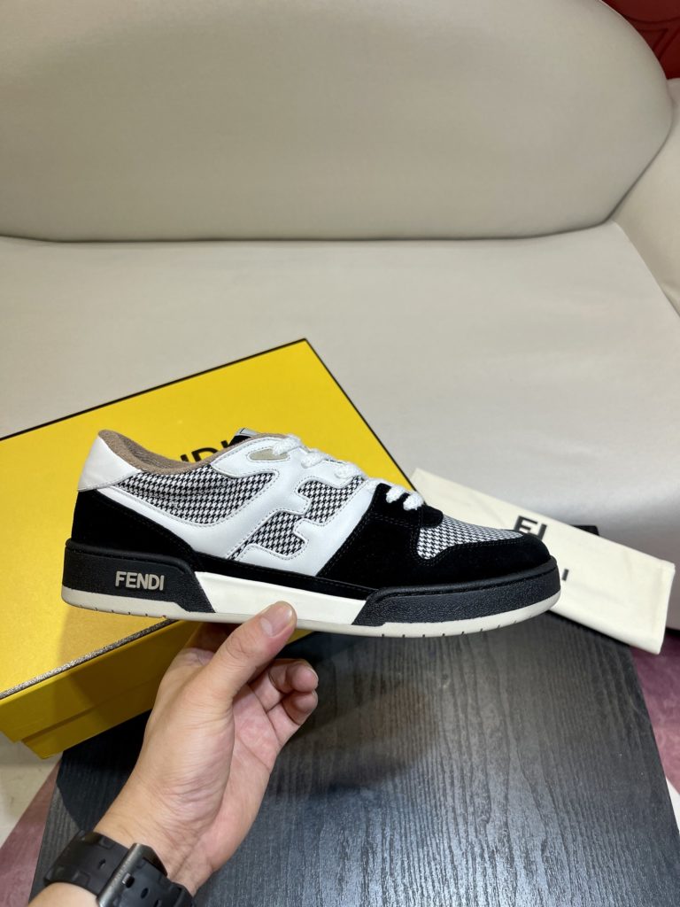 Fendi Match lace-up sneakers. Made of black suede and white leather, with white and black bird check fabric details. Rubber sole with Fendi on the side Size 39-44