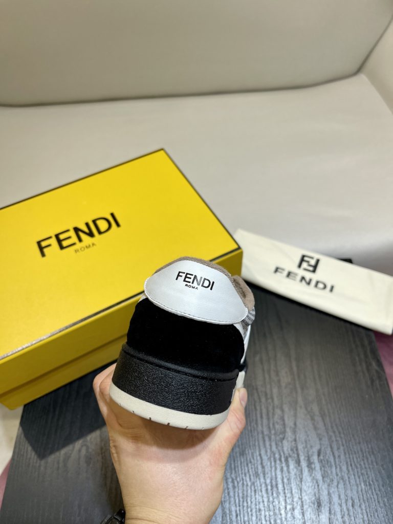 Fendi Match lace-up sneakers. Made of black suede and white leather, with white and black bird check fabric details. Rubber sole with Fendi on the side Size 39-44