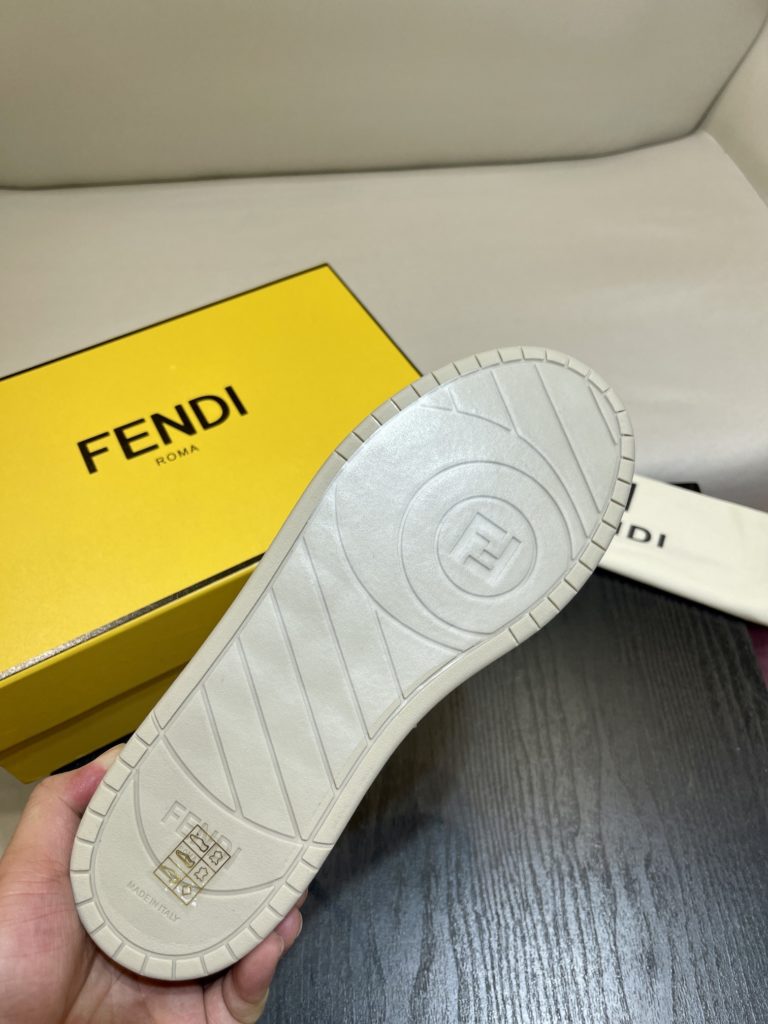 Fendi Match lace-up sneakers. Made of black suede and white leather, with white and black bird check fabric details. Rubber sole with Fendi on the side Size 39-44