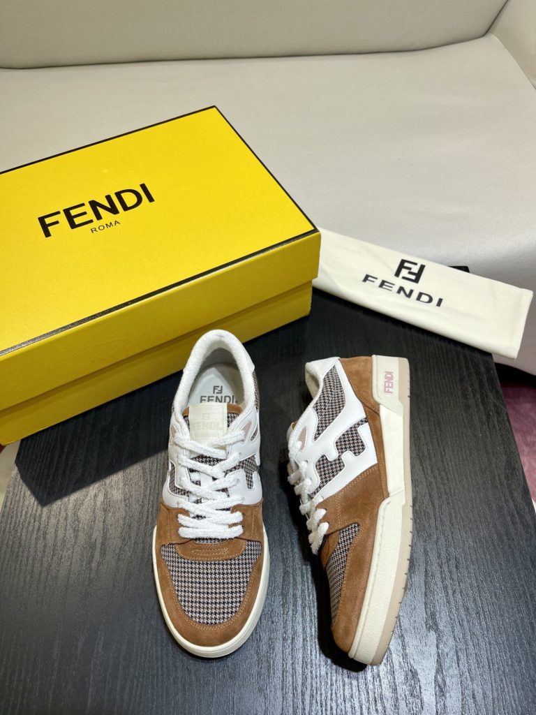 Fendi Match lace-up sneakers. Made of black suede and white leather, with white and black bird check fabric details. Rubber sole with Fendi on the side Size 39-44