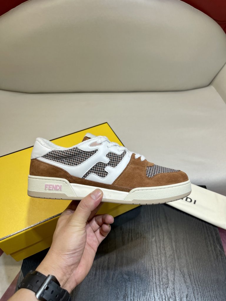 Fendi Match lace-up sneakers. Made of black suede and white leather, with white and black bird check fabric details. Rubber sole with Fendi on the side Size 39-44