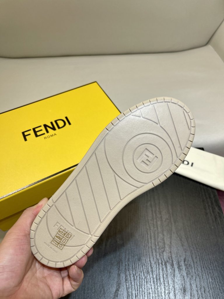 Fendi Match lace-up sneakers. Made of black suede and white leather, with white and black bird check fabric details. Rubber sole with Fendi on the side Size 39-44