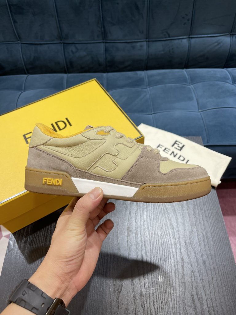 Fendi Match lace-up sneakers. Made of black suede and white leather, with white and black bird check fabric details. Rubber sole with Fendi on the side Size 39-44