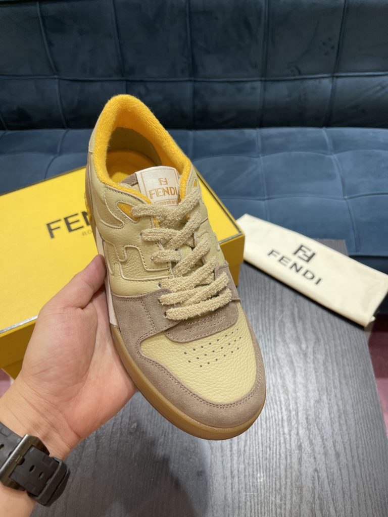 Fendi Match lace-up sneakers. Made of black suede and white leather, with white and black bird check fabric details. Rubber sole with Fendi on the side Size 39-44