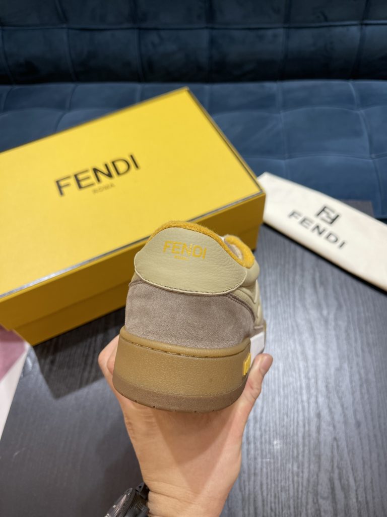 Fendi Match lace-up sneakers. Made of black suede and white leather, with white and black bird check fabric details. Rubber sole with Fendi on the side Size 39-44