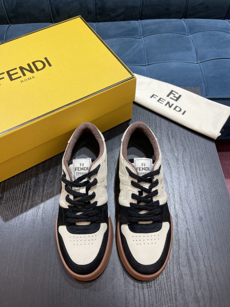 Fendi Match lace-up sneakers. Made of black suede and white leather, with white and black bird check fabric details. Rubber sole with Fendi on the side Size 39-44