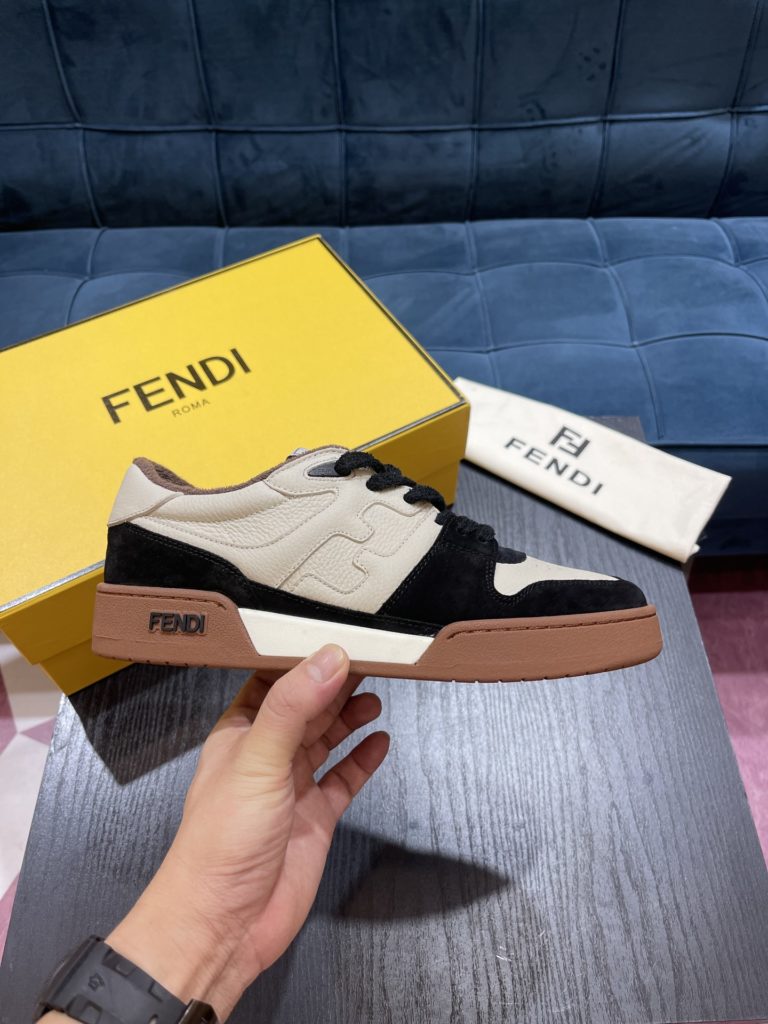 Fendi Match lace-up sneakers. Made of black suede and white leather, with white and black bird check fabric details. Rubber sole with Fendi on the side Size 39-44