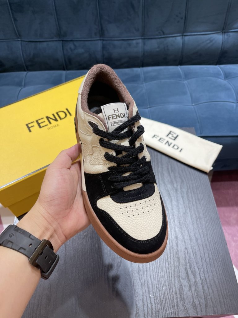 Fendi Match lace-up sneakers. Made of black suede and white leather, with white and black bird check fabric details. Rubber sole with Fendi on the side Size 39-44