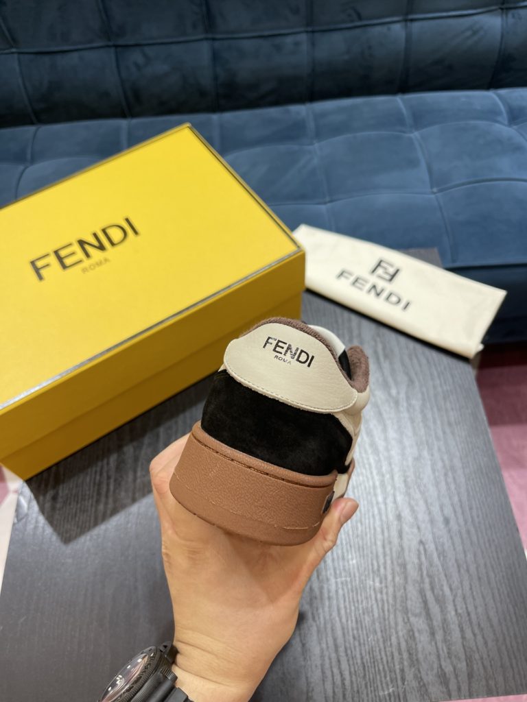 Fendi Match lace-up sneakers. Made of black suede and white leather, with white and black bird check fabric details. Rubber sole with Fendi on the side Size 39-44