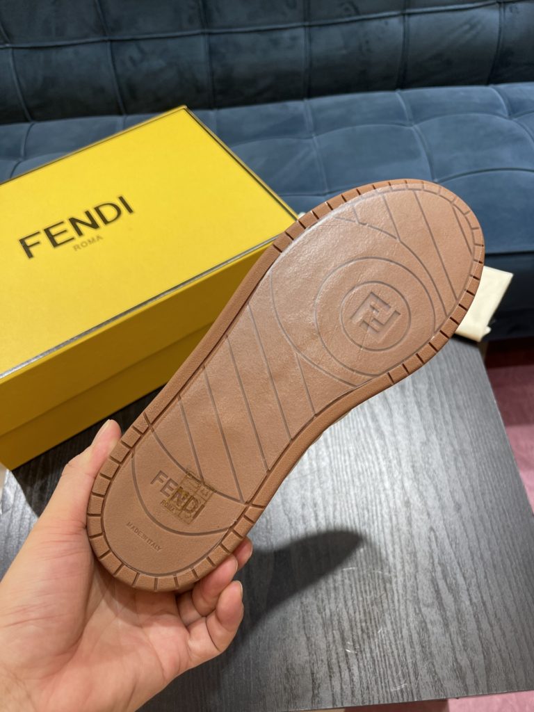 Fendi Match lace-up sneakers. Made of black suede and white leather, with white and black bird check fabric details. Rubber sole with Fendi on the side Size 39-44