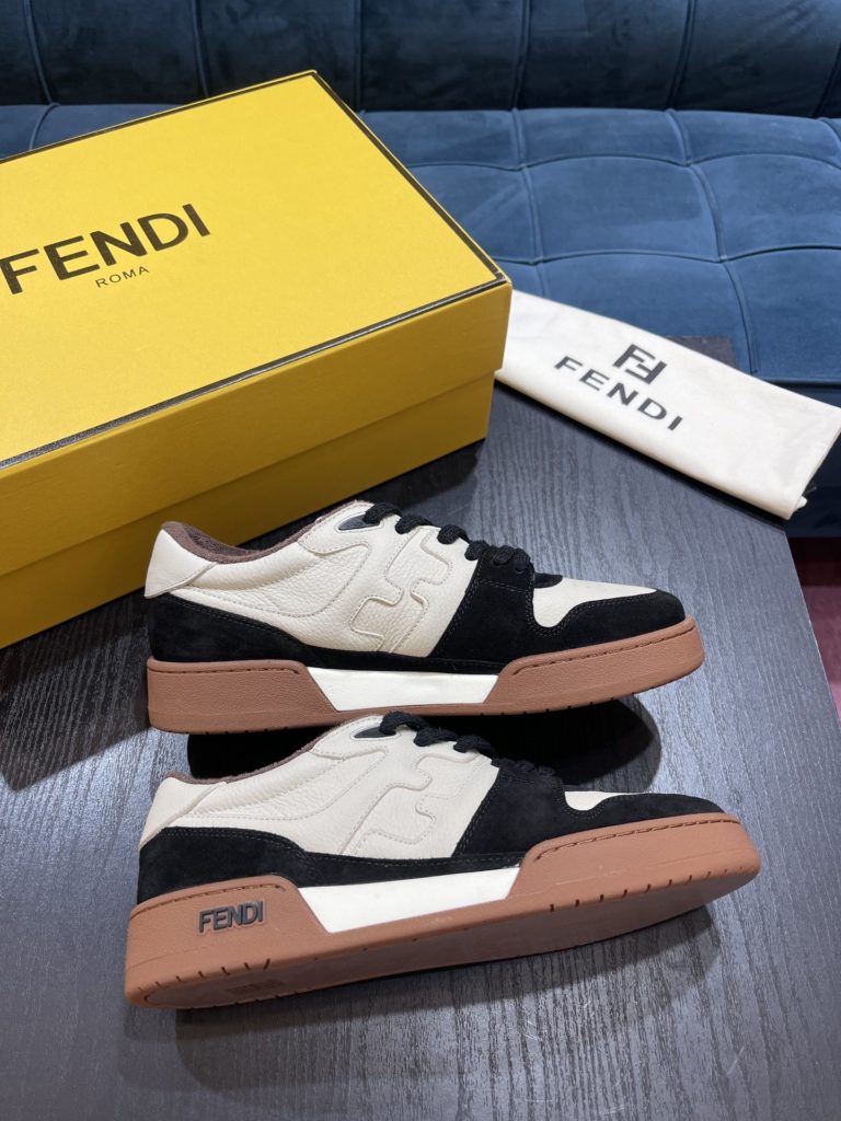 Fendi Match lace-up sneakers. Made of black suede and white leather, with white and black bird check fabric details. Rubber sole with Fendi on the side Size 39-44