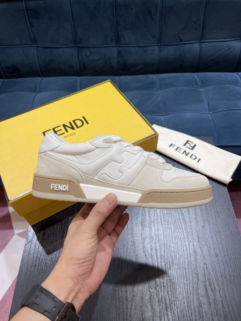 Fendi Match lace-up sneakers. Made of black suede and white leather, with white and black bird check fabric details. Rubber sole with Fendi on the side Size 39-44