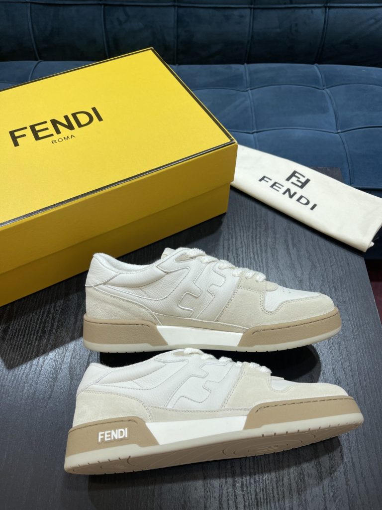 Fendi Match lace-up sneakers. Made of black suede and white leather, with white and black bird check fabric details. Rubber sole with Fendi on the side Size 39-44