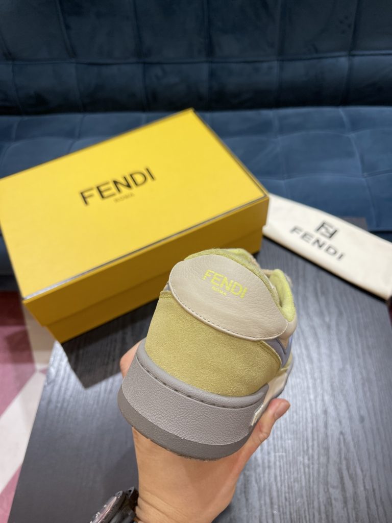 Fendi Match compact design sneaker with retro label on the tongue. The side is decorated with FF pattern stitching and Fendi embossing on the sole. White suede and leather. Decorated with the same color lace lace and lace. Rubber covered sole with beige cushioning material. Size 39-44