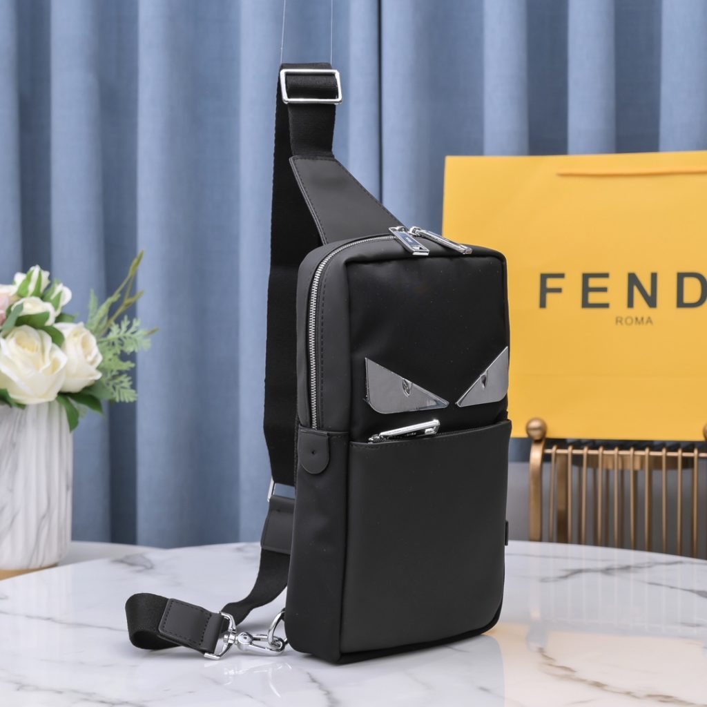 🆕🆕 Fendi FENDI Small Monster Rectangle Backpack 💯 () Men's cross body chest bag, made of original technology fabric and imported nubuck leather, is a bag for excellent travel experience. It has two compartments and a practical nylon shoulder strap, with adjustable length and is suitable for fastening on the left or right. The outer pocket and main compartment are opened and closed with a coated waterproof zipper. Two inner pockets. Breathable technical mesh fabric on the back. Size: 30-17-6CM Made in Italy Model 2330#