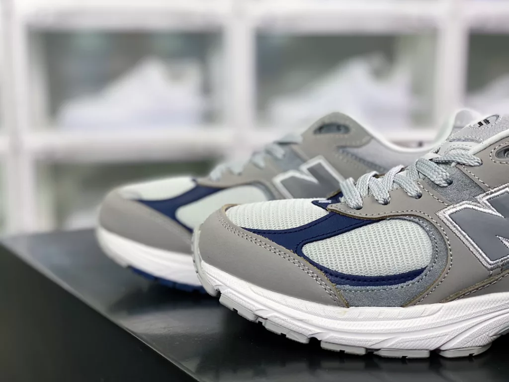 The retro flavor is too correct. Cooperate with the South Korean street brand Thisisneverthat x NB New Balance ML2002 series retro dad style leisure sports jogging shoes 