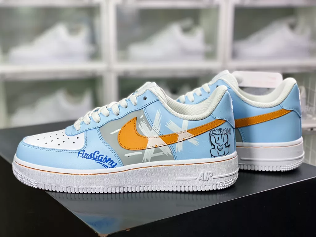 Nike Air Force 1 07 LV8 Air Force One Classic Low top Versatile Casual Sneakers Light Blue Dark Yellow White Black Bear Graffiti 