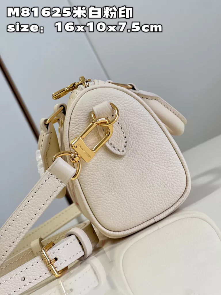 Factory price 540 [Top quality original order] M81625 Cream White Powder Printed Full Leather Pillow Bag Series This Nano Speedy handbag is made of Monogram Imprente leather and features a Monogram pattern through embossing and printing processes. The rolled leather handle, padlock, and rounded design are derived from the Speedy travel bag design introduced in 1930. Size: 16x10x7.5cm.