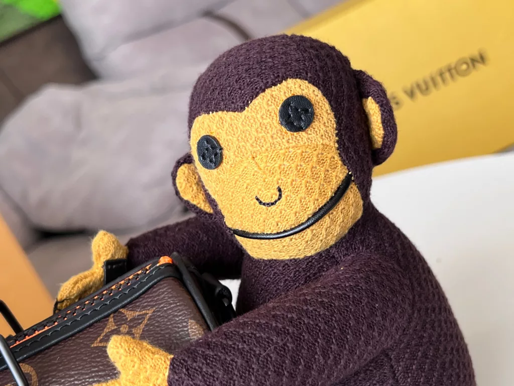 KEEPALL NANO Handbag M80118 Monkey doll In the Spring/Summer 2021 collection, menswear art director Virgil Abloh presents the Keepall Nano handbag. The bag comes with a knitted doll of Louis Vuitton's friends cartoon character from its 