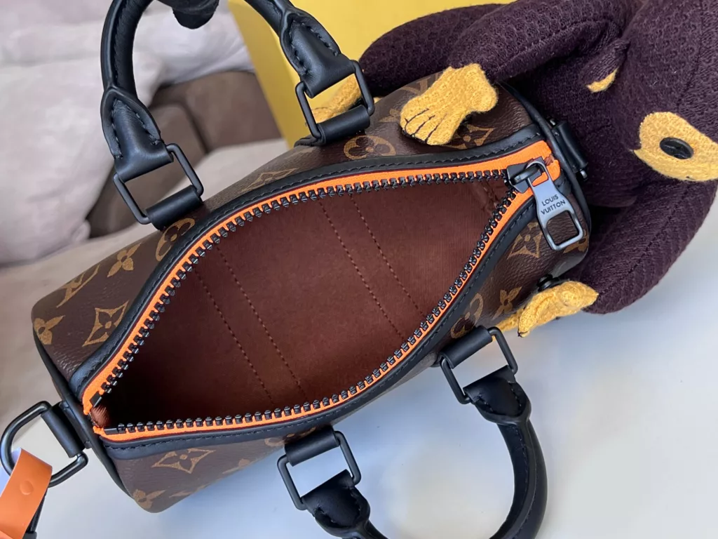 KEEPALL NANO Handbag M80118 Monkey doll In the Spring/Summer 2021 collection, menswear art director Virgil Abloh presents the Keepall Nano handbag. The bag comes with a knitted doll of Louis Vuitton's friends cartoon character from its 