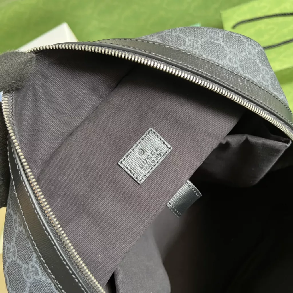 The backpack is made of elegant black GG Supreme canvas material, which echoes the meaningful design of the 