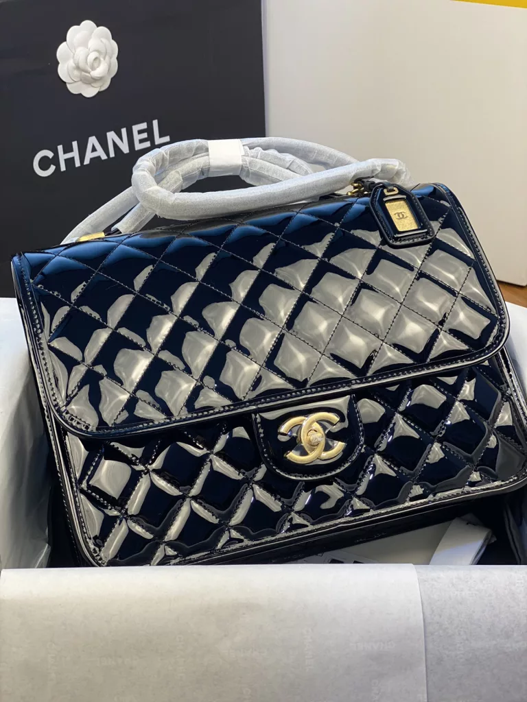 Chanel 22k patent leather backpack