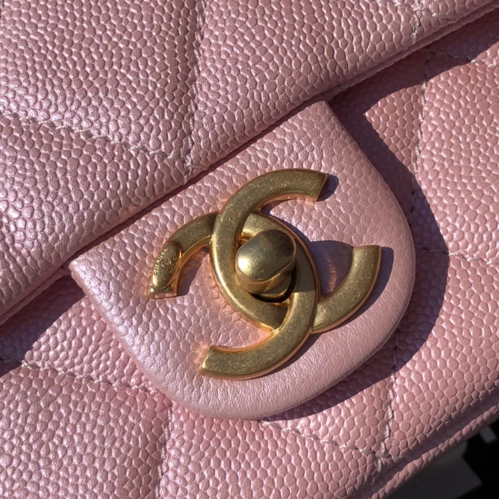 Chanel 21K Caviar clamshell bag