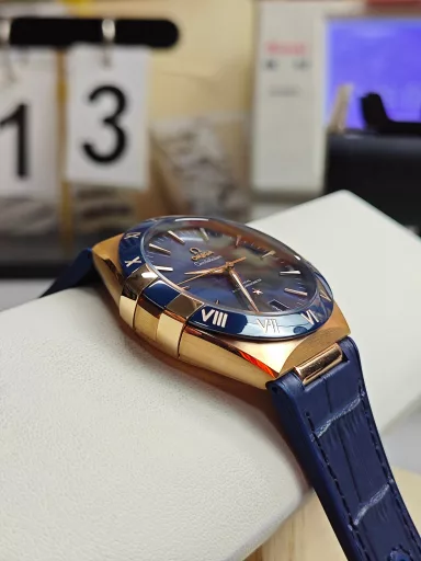 VS Omega Constellation Gold Blue Dial