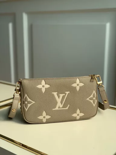 The Multi Pochette Accessories handbag is a three-in-one dynamic design made of Monogram canvas, with multiple pockets and compartments. The adjustable gold chain and Louis Vuitton jacquard shoulder strap provide multiple carrying methods such as crossbody.