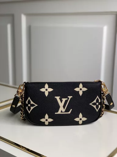 The Multi Pochette Accessories handbag is a three-in-one dynamic design made of Monogram canvas, with multiple pockets and compartments. The adjustable gold chain and Louis Vuitton jacquard shoulder strap provide multiple carrying methods such as crossbody.