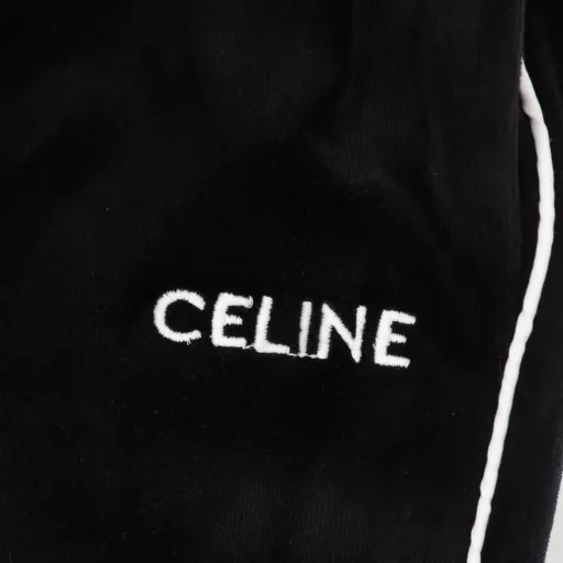 Celine velvet zipper trousersCustom-woven and custom-dyed velvet fabric Custom double-c embroidery pieces Laser-cut and heat-pressed onto the trousers New custom hardware accessories The wool feels particularly silky and can show different colors in the sun. Very classy when worn!